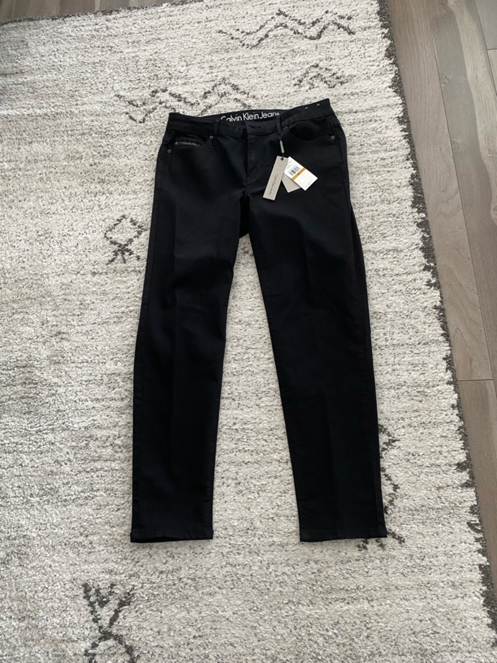 Calvin Klein black ankle skinny jeans, 29 waist, 27 inseam, NWT.